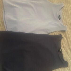 set of 2
Navy and baby blue tank
Never worn
Tight fitting 
Seamless